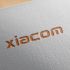 Логотип для Xiacom - дизайнер zozuca-a